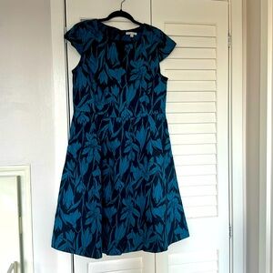 A line tea length blue dress